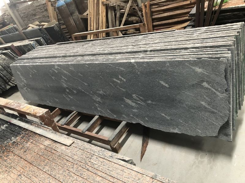 Fish Black Granite flooring tiles.jpg Fish Black Granite flooring tiles.jpg